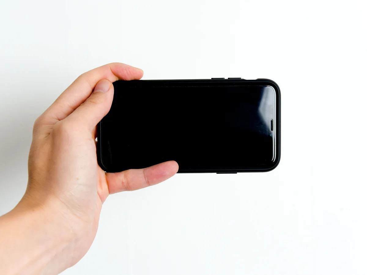 Smartphone used to contact AIFONE Care in Kochi